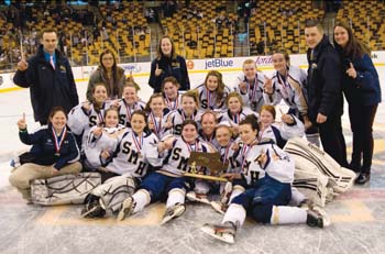 The St. Mary’s High School girls hockey team celebrates on the ice at the TD Garden after defeating Arlington Catholic to win the Division 1 state championship.