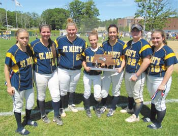 St. Mary’s High School seniors Alison Butler, Taylor Cash, Brooke L’Abbe, Victoria Viger, Casey Fanning, Kaleigh Finigan, and Nicole Fioravanti display the Division 3 state finalist softball trophy after the championship game Saturday at Rockwood Field in Worcester. The Spartans fell to Assabet Valley Regional, 5-2.