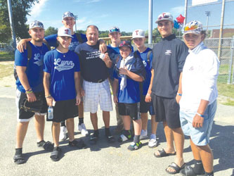 The Babe Ruth 15-year old All-Stars presented Greater Lynn Babe Ruth president Jim Beliveau with a signed baseball when they arrived home Sunday from their trip to the World Series. Beliveau is surrounded by players David Barnard, Christian Burt, Matt Gisonno, Zach Elwell, Mike Leavitt, James Wilkins, Anthony Nikolakakis and Dayshon Anderson.